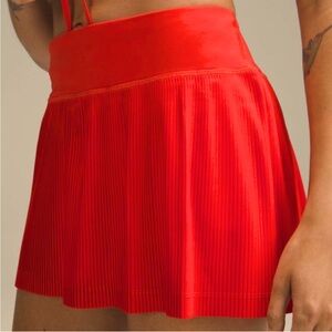 Lululemon Pleat to Street Mid-Rise Skirt -
Hot Heat - Sz 4 -NWT